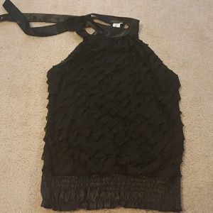 Black high neck top with ruffles and sinched waist