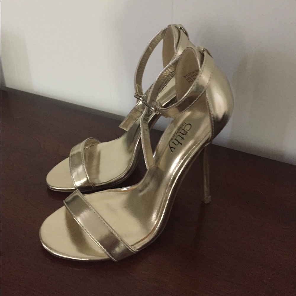 Never worn gold strap heels