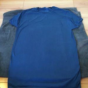 2 blank shirts . Dark blue and light blue