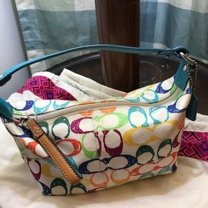 Cute small Tote  Coach ! clean used a few times.