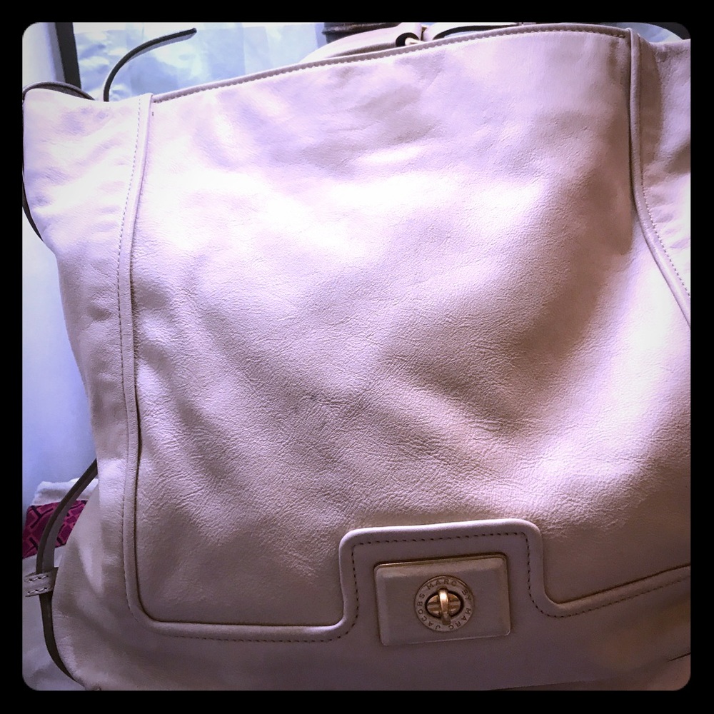 Cream colored Marc Jacobs bag. SOLD As Is!