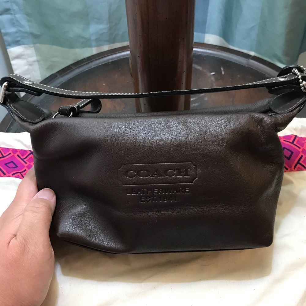 Tiny hand tote. Coach Dark Brown- SOLD AS IS