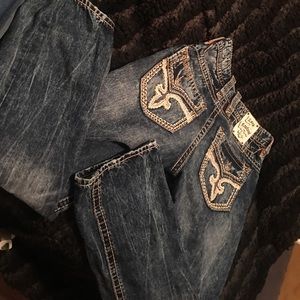 MEN ROCK REVIVAL JEANS. Size : 32. Slightly worn.