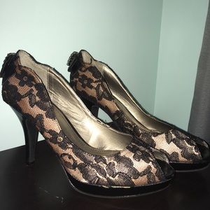 Tan heals with black lace