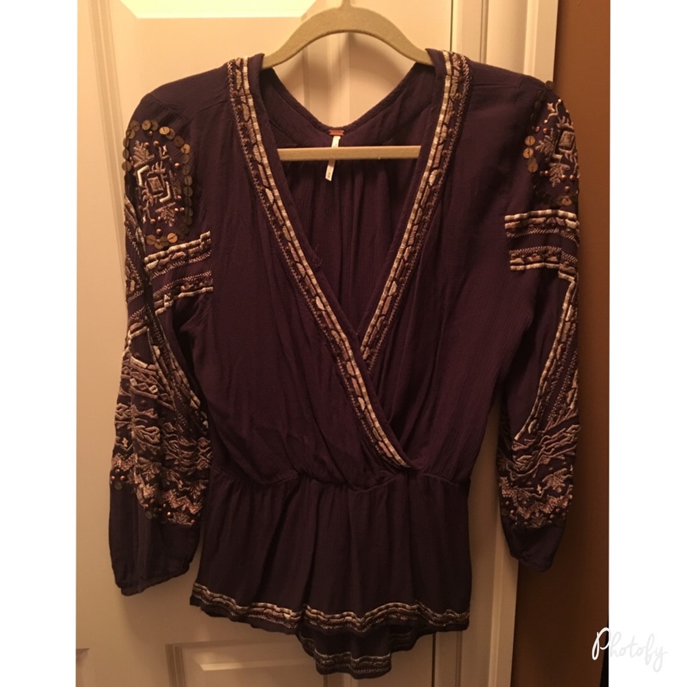 Low cut, heavy fabric, detailed blouse
