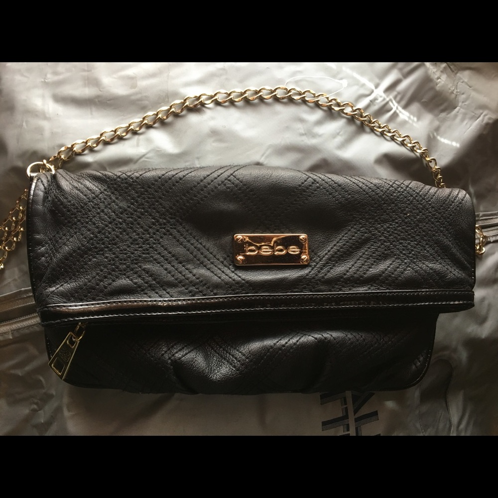 Bebe cross body clutch