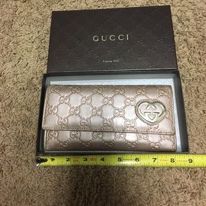 Authentic Gucci wallet metalic rose gold