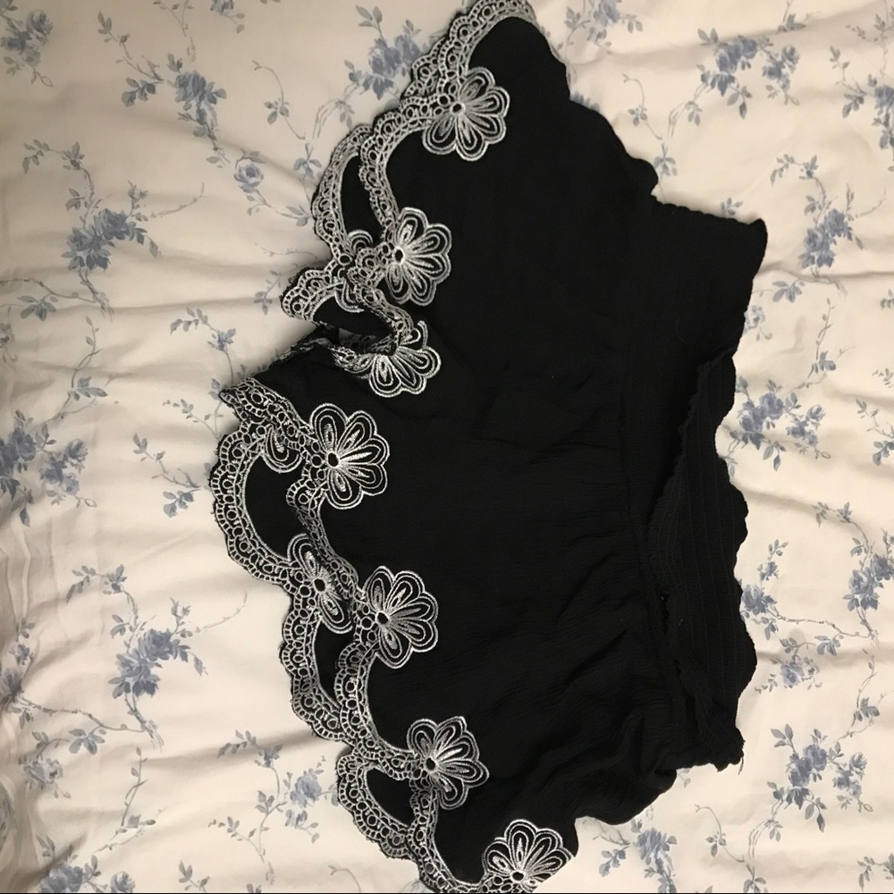 Billabong black shorts with white ruffle