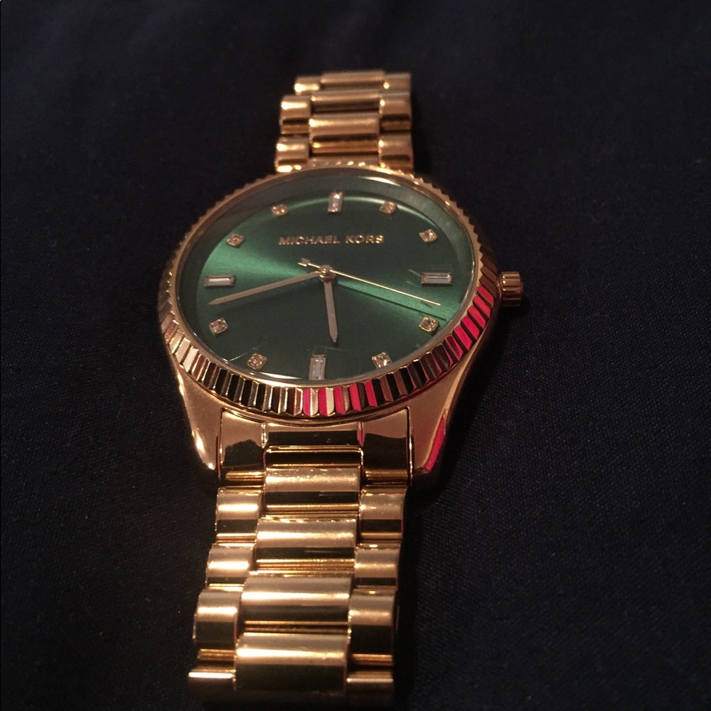 Gold MK watch