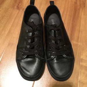 Matte black sneakers