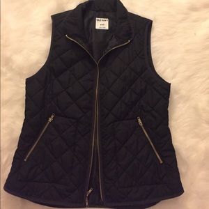 Black and gold vest