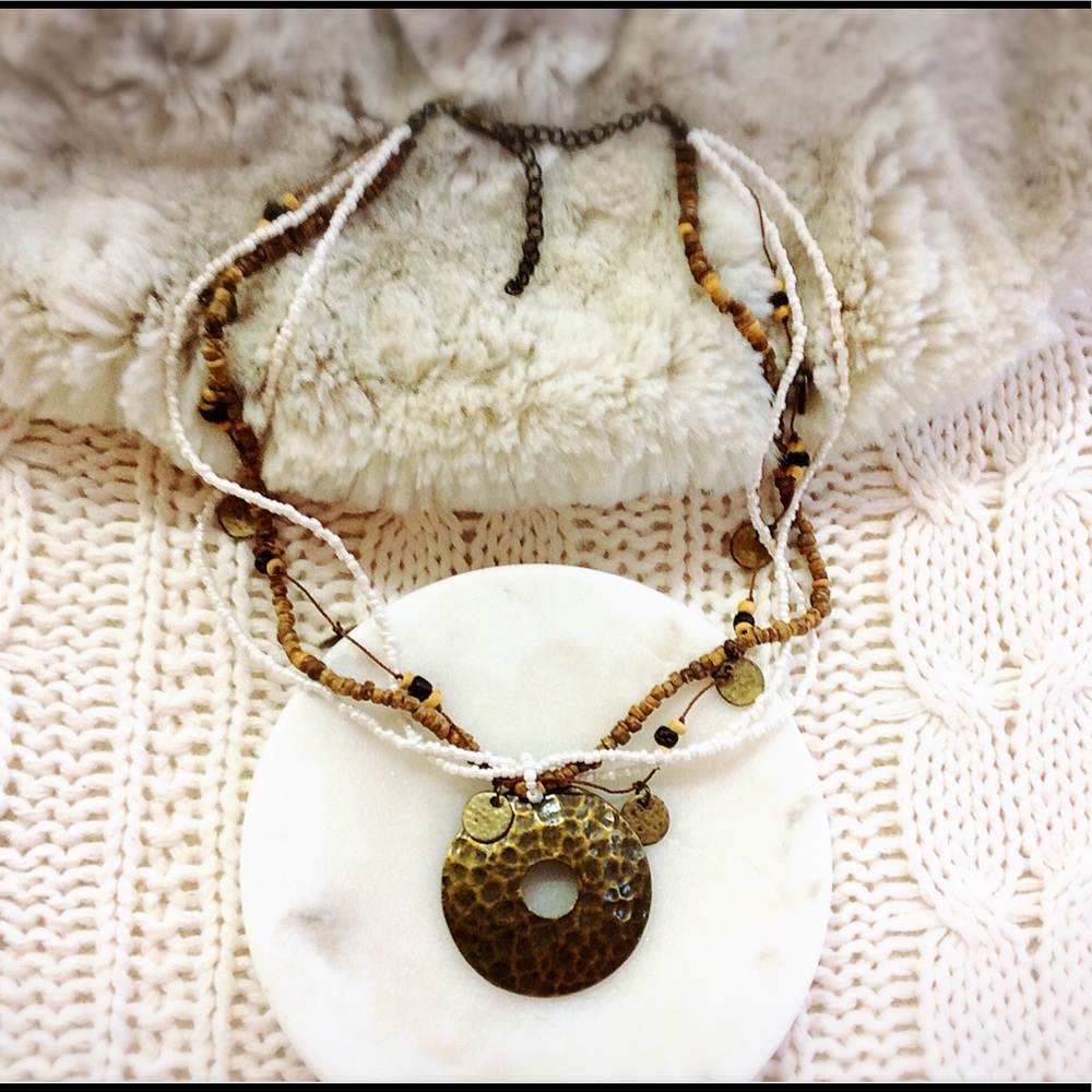 Multi chain beaded necklace w Bronze pendant