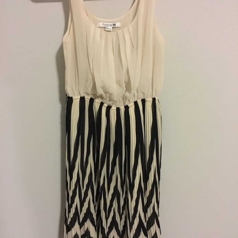Medium length off-white dress with black stripes