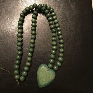 Green wooden beaded necklace with heart pendent