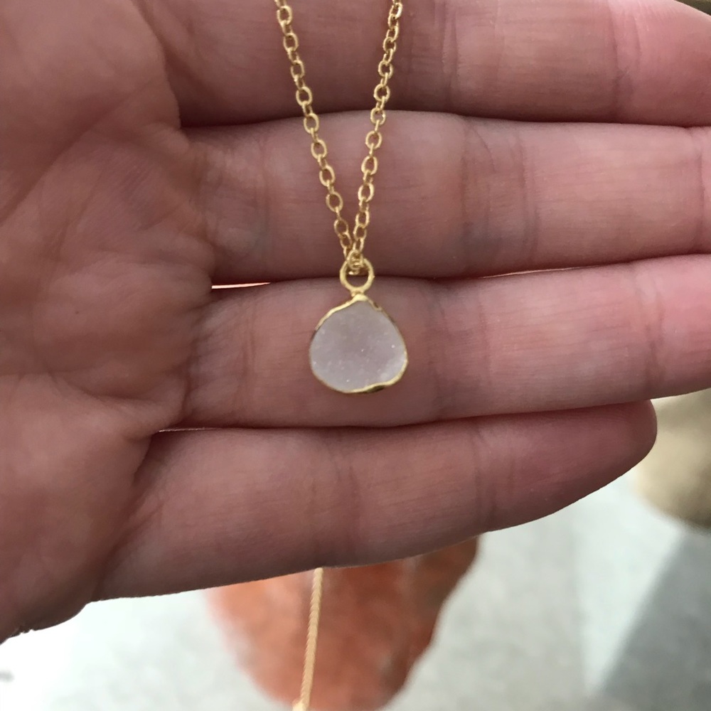 Gemstone necklace on a dainty gold chain