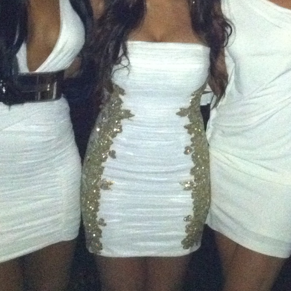White strapless with gold detail on sides