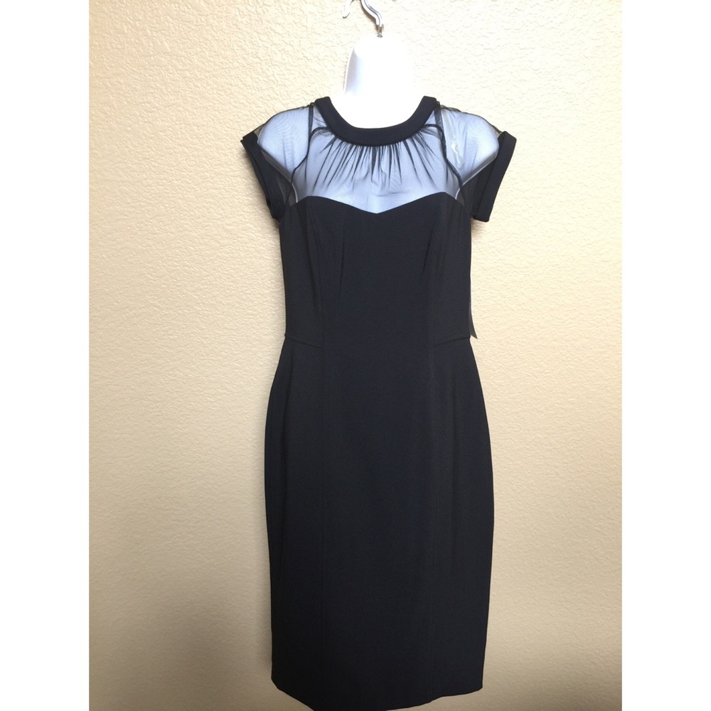 Sexy Maggy London black fitted.