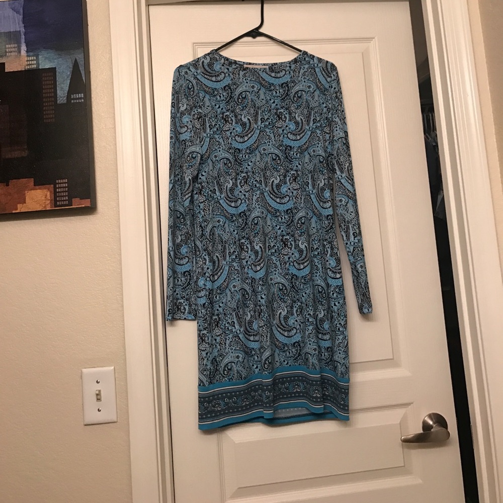 Blue long sleeved designer dress