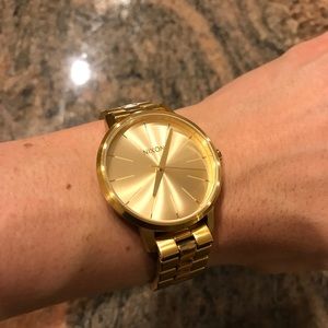 Yellow gold Nixon watch