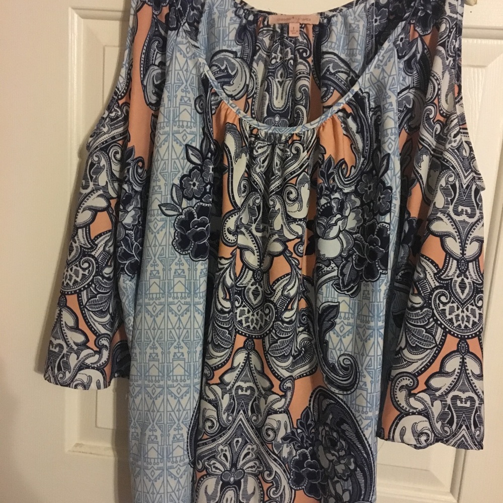 Cold shoulder blouse.