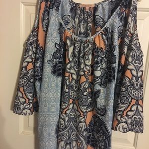 Cold shoulder blouse.