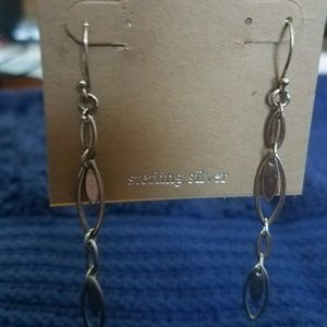 Sterling Silver dangle earrings.