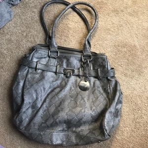 Jennifer Lopez faux snakeskin purse