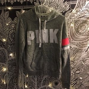 grey white and pink zip up sweatshirt