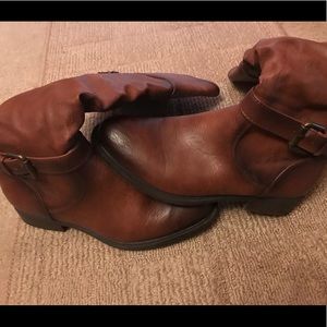 Size 7 distressed calf boots.