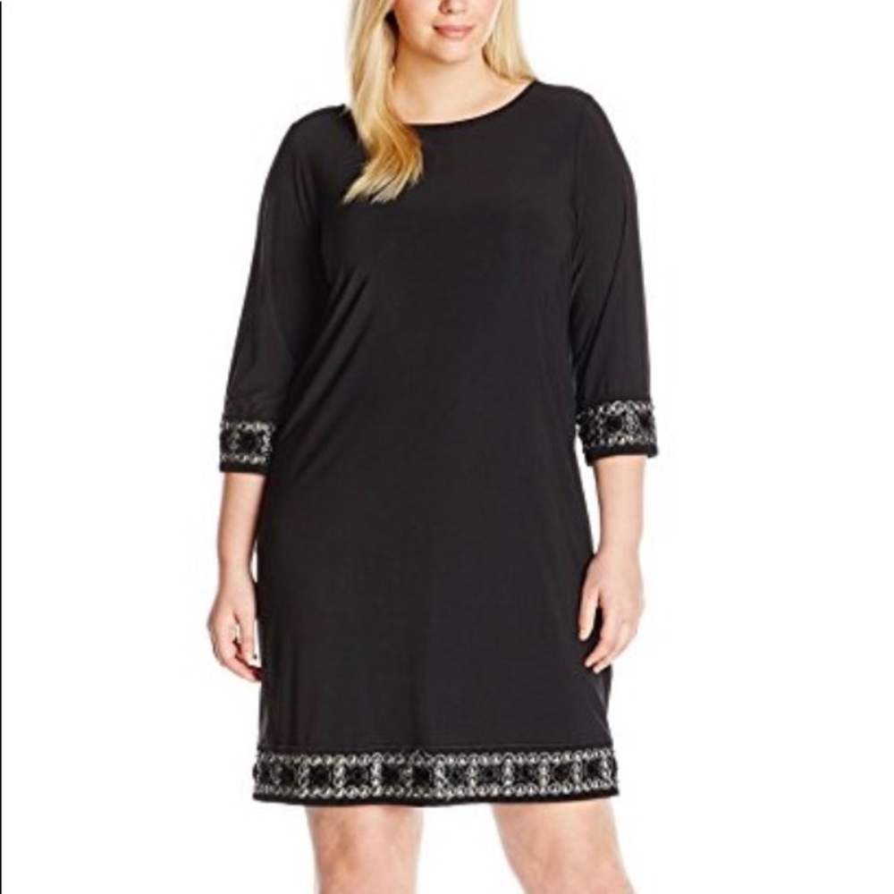 Black cocktail dress w/ silver & black details