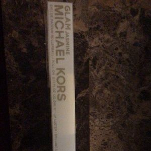 Michael kors rollerball/lipgloss travel duo