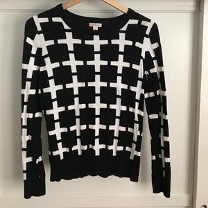 Black and white cross pattern sweater