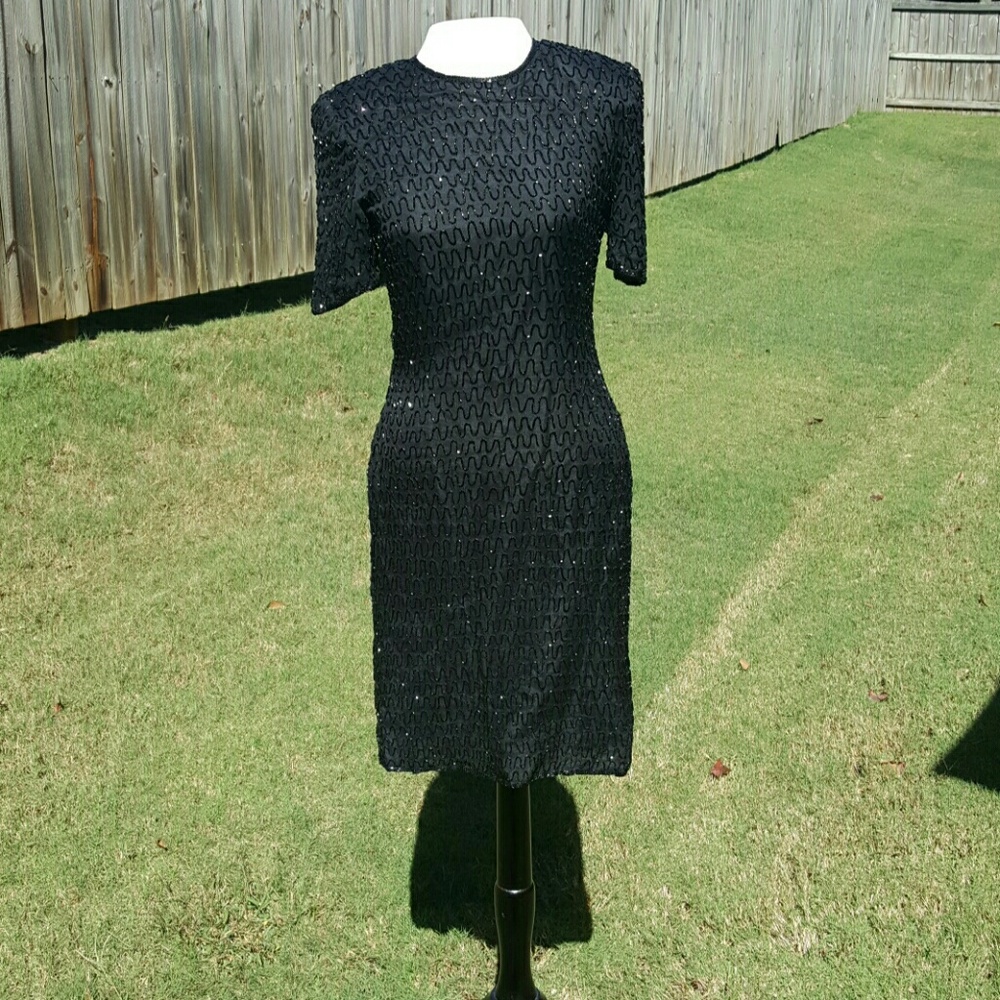 Black sequin dress. Knee length. 100% silk.