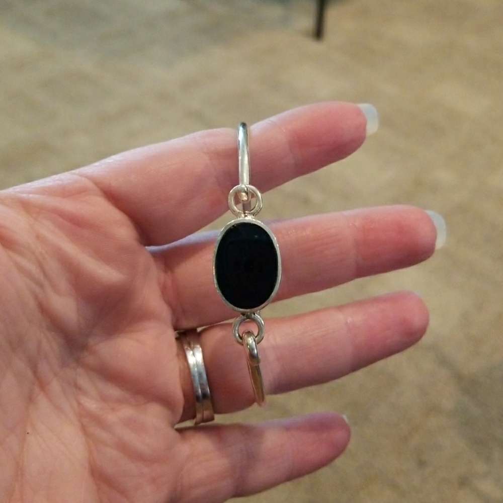 Sterling silver bangle with black clasp