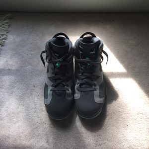 Grey and teal Jordan (forgot the number)