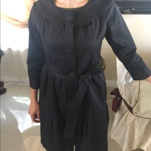 Beautiful trench coat ruffles in the neck