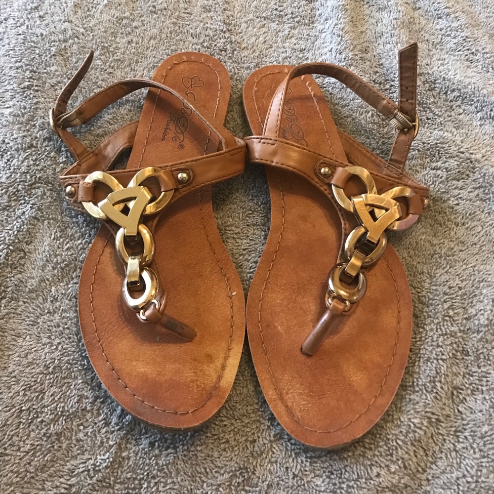 Brown and gold sandals