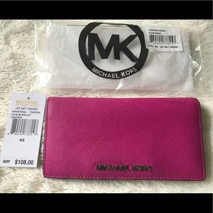 MK Jet set fuchsia saffiano wallet