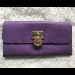 MK lilac purple lock logo wallet saffiano
