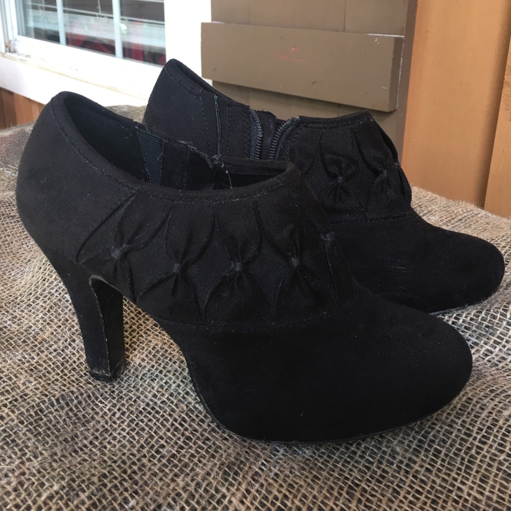 Gently used black booties
