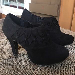 Gently used black booties