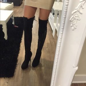 Black thigh high boots