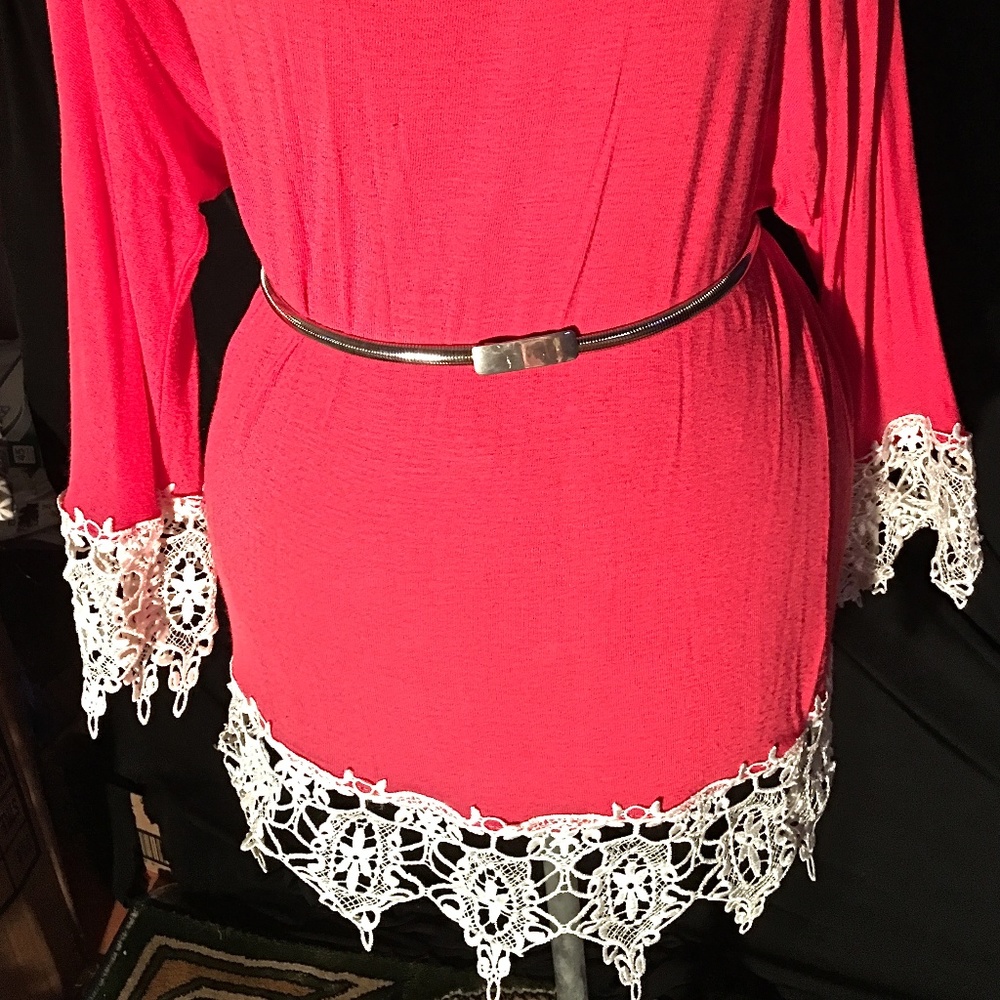 Salmon top with intricate lace trim