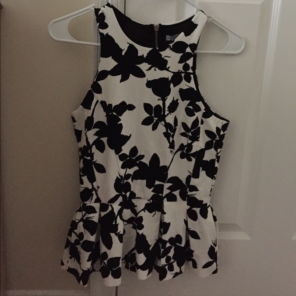 Vibrant White and Black peplum top