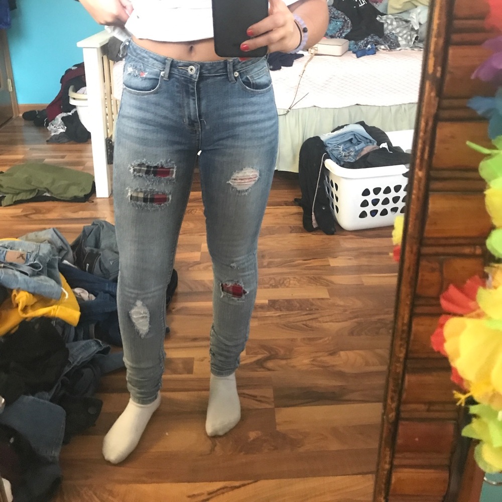 Holey plaid jeans