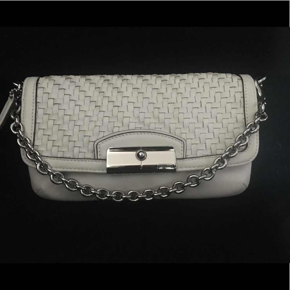 Coach off-white woven clutch