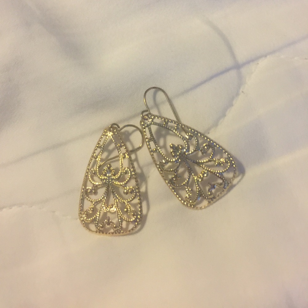 Never worn gold earrings