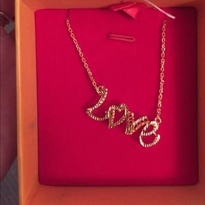 Gold love necklace