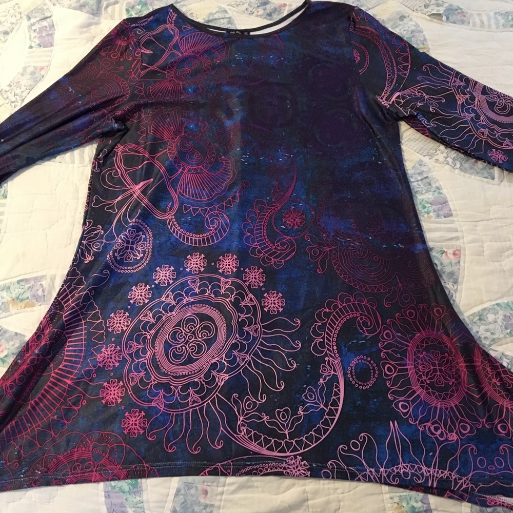 Beautiful long shirt that flares at the bottom