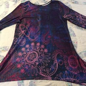 Beautiful long shirt that flares at the bottom